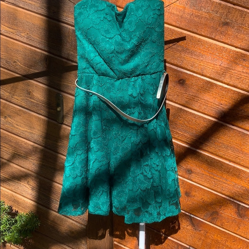 Beautiful teal strapless dress with a silver belt